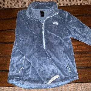 light blue fleece North Face jacket